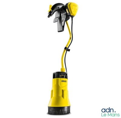 un aspirateur jaune et noir sur fond blanc