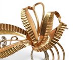 pair of gold and diamond brooches, by van cleef