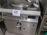a large stove with a number on it in a kitchen