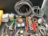 many different types of welding tools and tools on the table