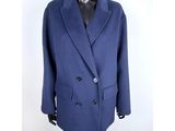 men ' s blue double breasted peale coat on mannequin mannequin mannequin mannequin mannequin mannequin mannequin
