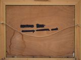 a picture of a piece of wood in a wooden frame