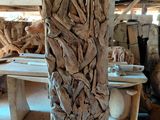 a large piece of drift wood sitting on a table