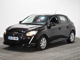 la photo d'une voiture noire garée sur un sol en damier