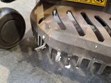 a close up of a machine that is on the ground