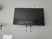 1 écran plat TCL 80cm