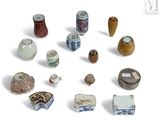 many different types of vases that are on the table