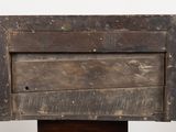 a wooden box on a stand on a white background