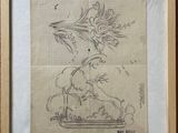 framed drawing of a cat and a bird on a table
