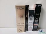 deux boîtes de produits Lancôme posées l'une à côté de l'autre sur une table