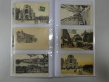 a picture of a collection of old postcards on a refrigerator