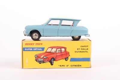 a blue toy car sitting on top of a box