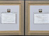 two framed pictures of a certificate and a certificate on a wall