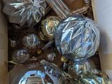 a box full of christmas ornaments that are inside of it