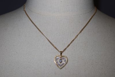 necklace with a heart shaped pendant on a mannequin mannequin mannequin mannequin mannequin mannequin mannequin mannequin