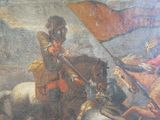 un tableau représentant un homme à cheval tenant un drapeau