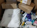 a cardboard box filled with many different types of items