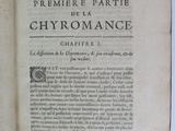 an open book with a black and white title on it