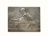 a plaque of a man playing a game of chess