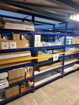 many boxes and boxes on the shelves in the warehouse