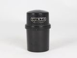 a close up of a black cup on a white surface