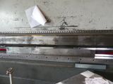 a machine that is working on a sheet of paper
