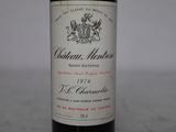 a bottle of wine that is sitting on a table