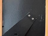 a picture of a blackboard with a pair of scissors stuck to it