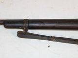 two old tools that are laying next to each other