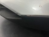 a close up of the front bumper of a car