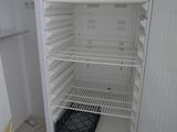 an open refrigerator with a lot of food inside of it