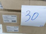 a box with a sign on it sitting on top of a table