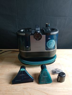an image of a table with a blender and other items sitting on top of it