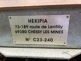 a sign that says hekipia on the side of a truck