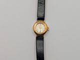 an image of a wrist watch on a white surface with a black strap