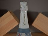 a bottle of champagne that is sitting on a table