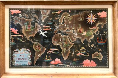 une image représentant une carte du monde dans un cadre en bois