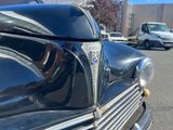 a close up of a car with a number plate on it