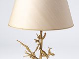 pair of brass birds on a branch table lamps