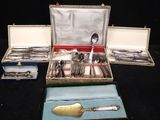 a box of silverware sitting on a black table