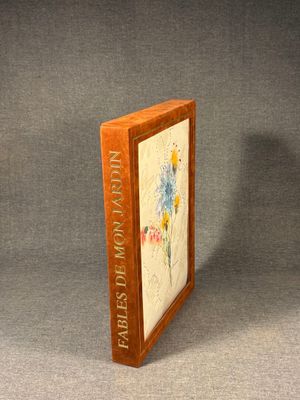 an image of a book with a picture of a flower on it