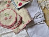a table with a lot of different types of cloths