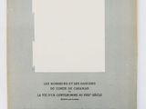 a black and white photo of an old book with a picture on it
