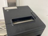 a close up of a printer sitting on top of a counter
