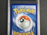 a close up of a pokemon card in a plastic case
