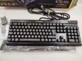 a computer keyboard and mouse sitting on a table