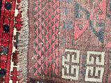 rugs and rugs are laid out on the floor in a room