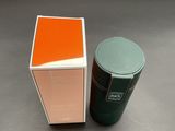 an orange and green box next to a green and white box