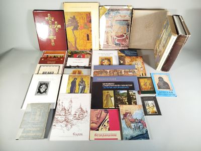 a lot of books that are sitting on a table