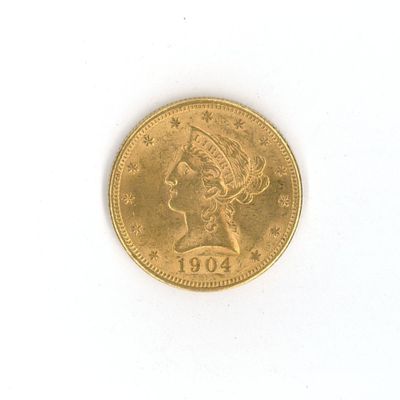 une pièce d'or ornée d'une tête de femme